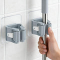 Broom Holder Wall Mount, 4 Pack Mop and Broom Holder, PlasticBroom Hangers for Wall, Gray, Space-Saving Tool Organizer for Kitchen Laundry Garage Garden, Easy Install, Non-Slip Grips