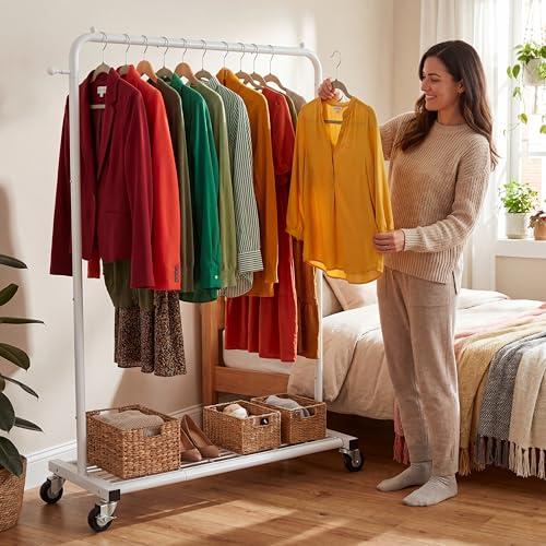 Sywhitta Clothing Rack on Wheels with Mesh Storage Shelf & Sturdy Metal Frame, Rolling Garment Rack for Hanging Clothes, Coats, Skirts, 39.76" L x 16" W x 64.56" H,White - color: White