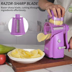 Upgrade Rotary Cheese Grater Shredder with Handle, Strong Suction Base, Multi-purpose Rotary Grater Slicer with 5 Interchangeable Blades for Ice, Vegetables, Fruit, Nuts with Blade Storage Box - color: Purple