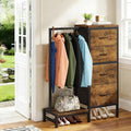 HIGDBFE Dresser with Hanging Rack, 4 Drawers Small Closet for Bedroom, Reversible Fabric Kids Chest of Drawers with Clothes Rack, Tall Storage Tower, Sturdy Frame, Rustic Brown, 44''H - color: Rustic Brown