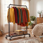Sywhitta Clothing Rack on Wheels with Mesh Storage Shelf & Sturdy Metal Frame, Rolling Garment Rack for Hanging Clothes, Coats, Skirts, 39.76" L x 16" W x 64.56" H,Black - color: Black